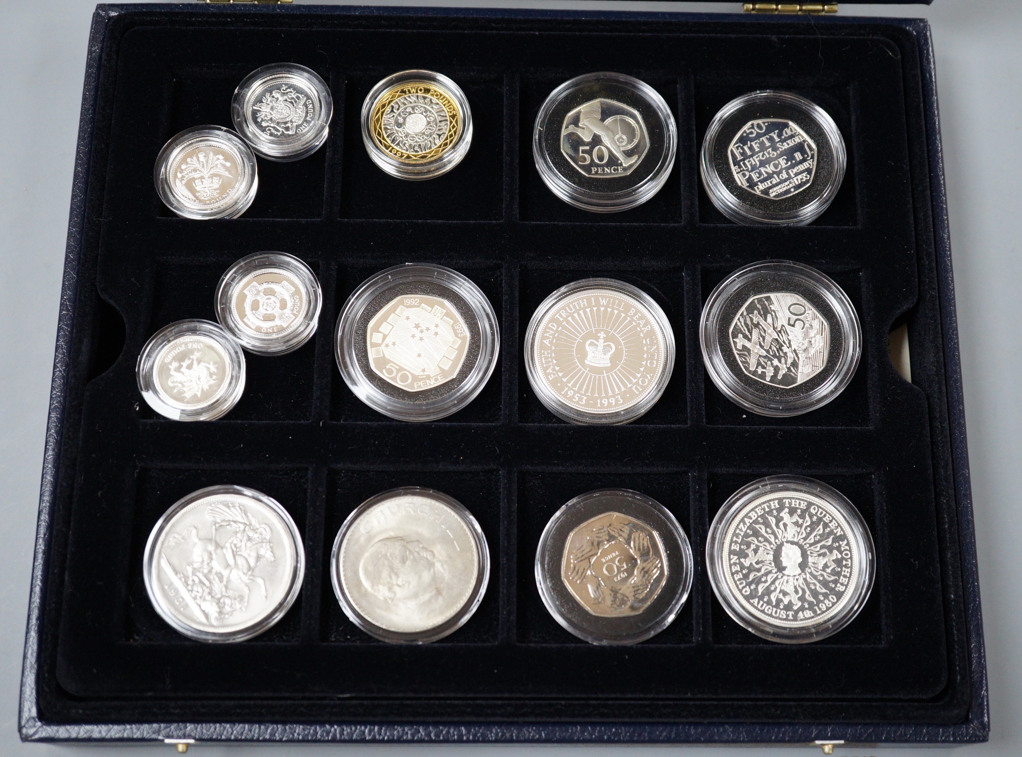 A group of Royal Mint UK commemorative silver proof coins, including 1996 Northern Ireland £1, 1983 royal arms £1, 1995 Welsh £1, 2005 Dictionary 250th anniversary coin, four minute mile 50p, 1997 £2, 50th anniversary D